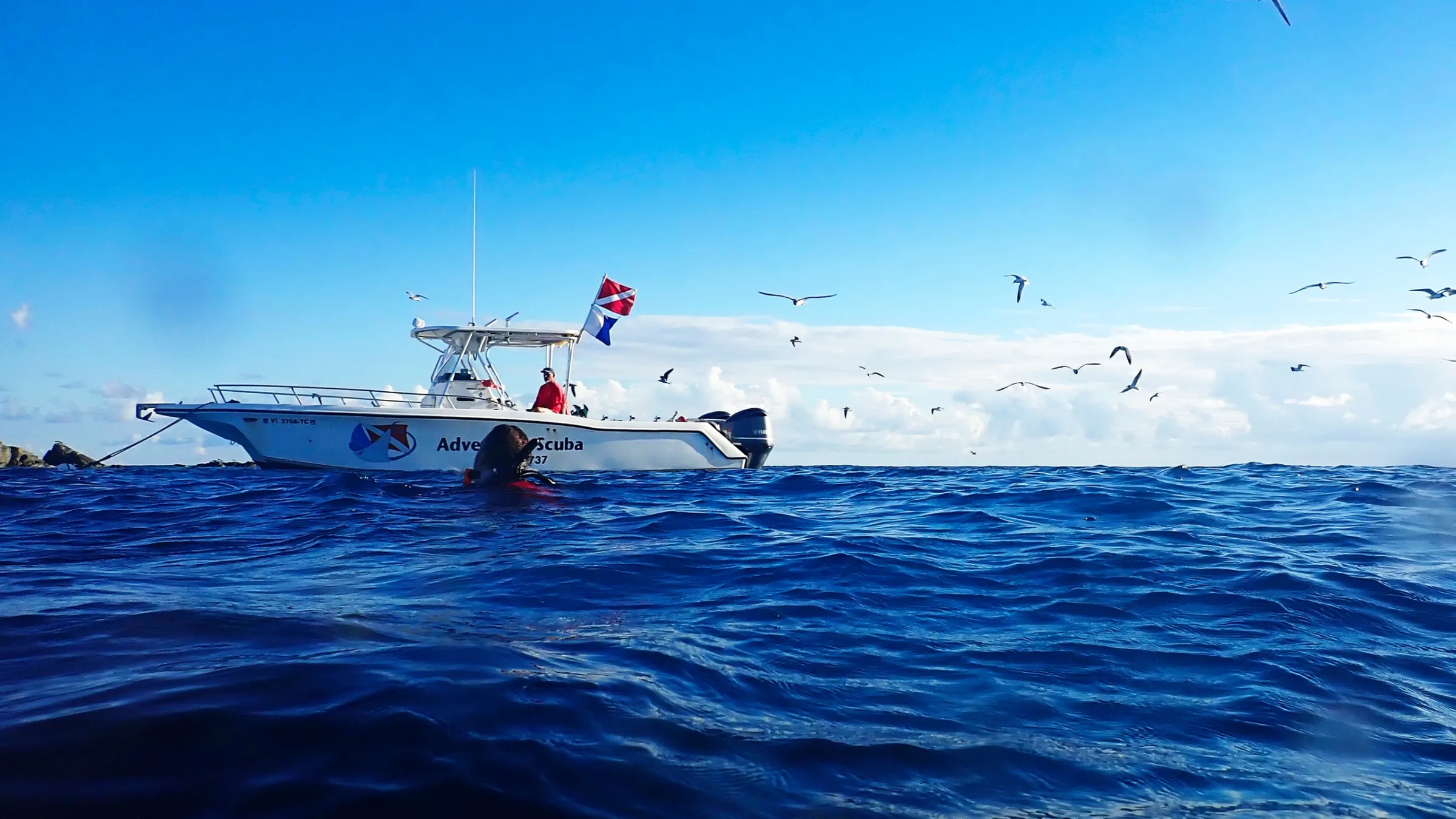 a plane flying over a body of water