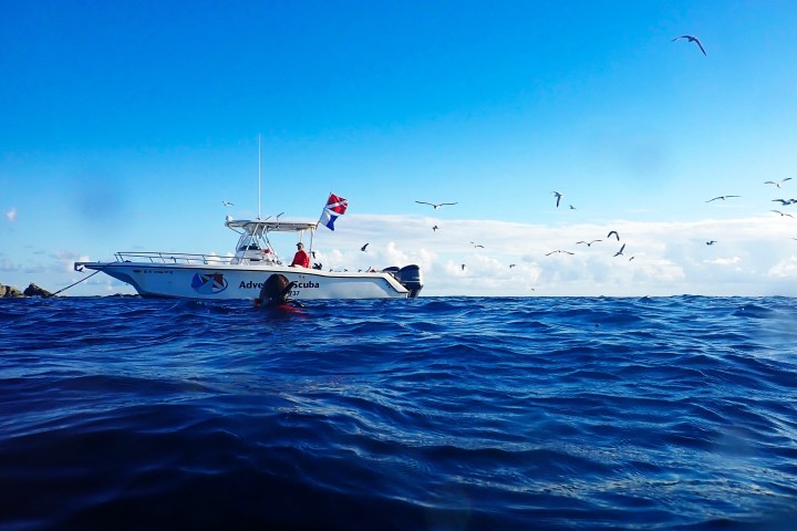 a plane flying over a body of water